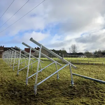 solar array racking system and ground screw foundations